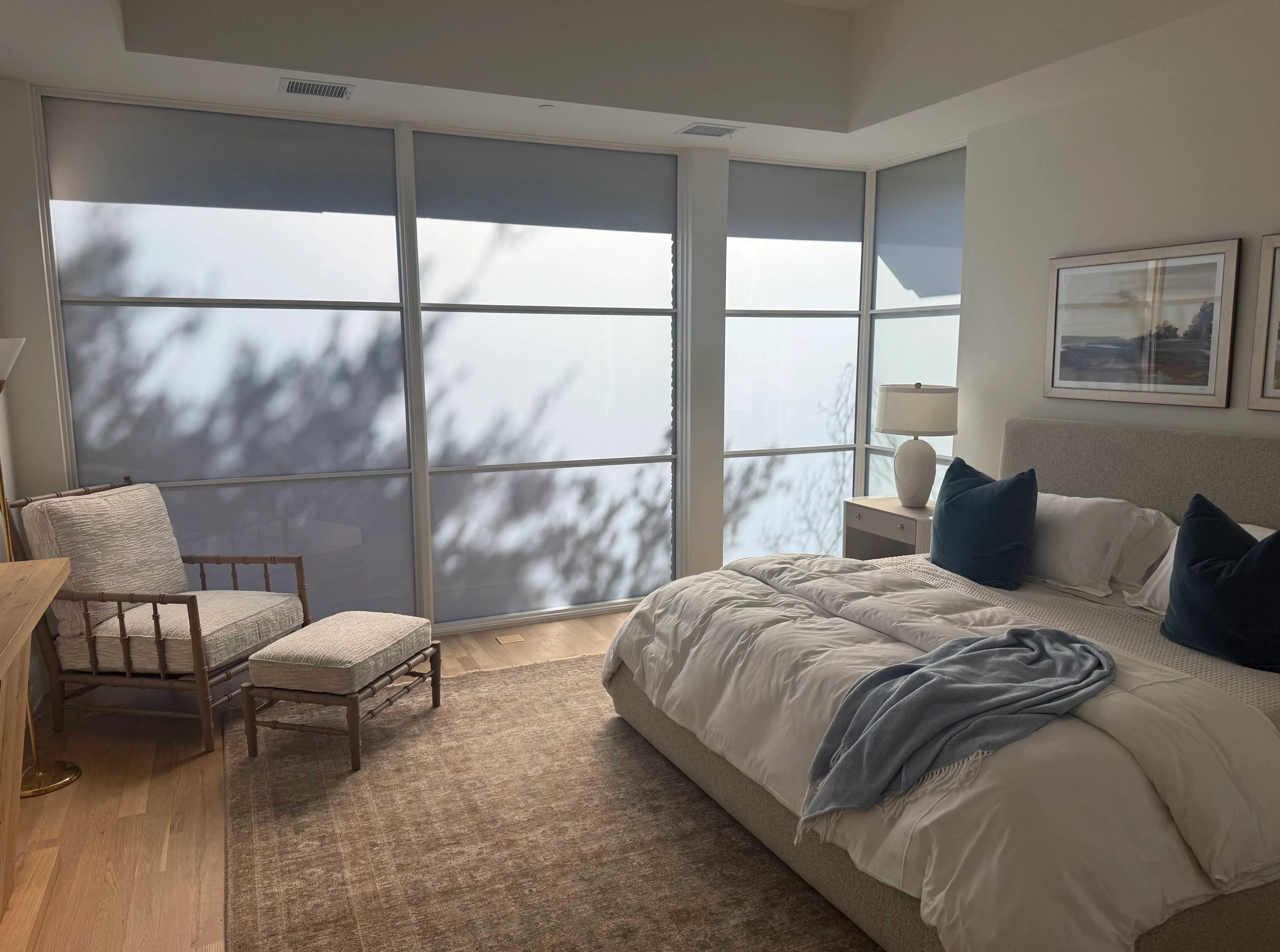 The same bedroom window wall switched to frosted for privacy