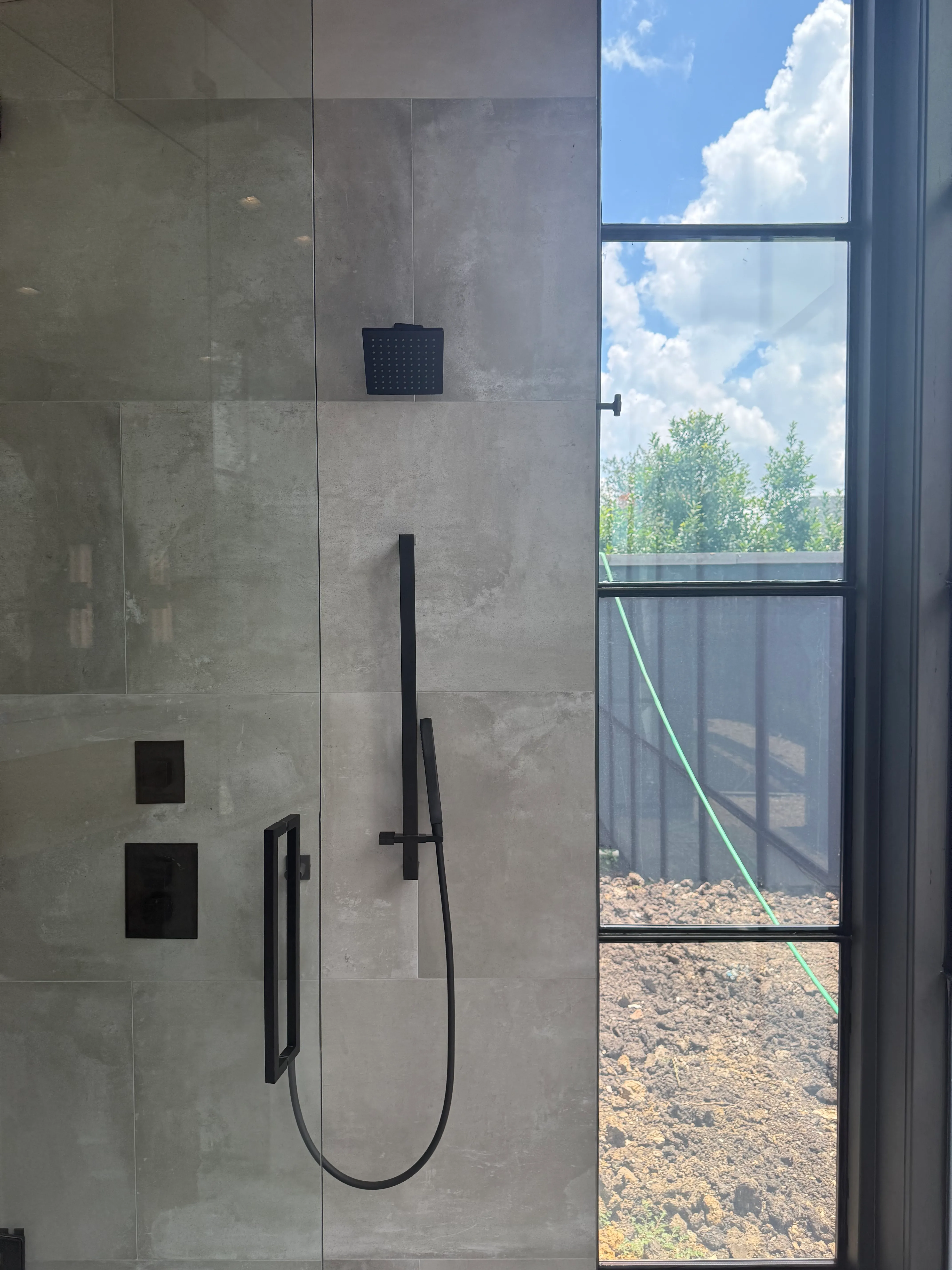 Home shower with Revive smart glass in its clear state